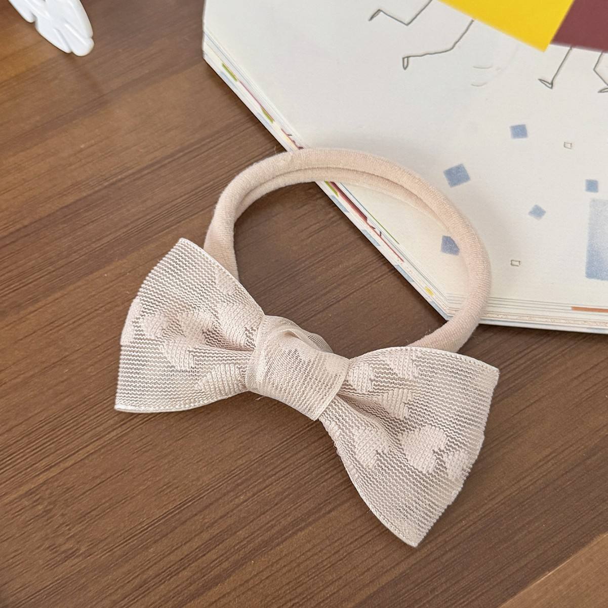 Beige bow with heart prints baby headband 